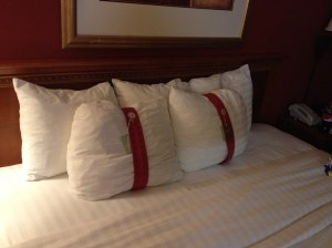 What are these tiny pillows on a king bed?!!