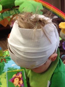 That's cute that you big people think you can keep my head wrapped in gauze for an entire day.