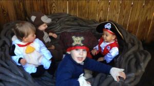 Connor in the cow costume, Malcolm as the monkey, Max as the big pirate, and their friend David the pirate.