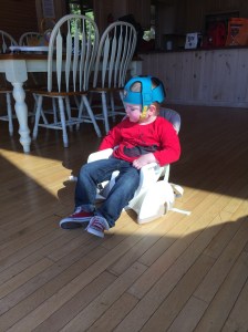I discovered his love for sitting in the chair without a chair when I set it on the floor during a weekend in the mountains and he didn't want to get out of it. 